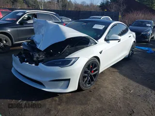2023 Tesla Model S Plaid with VIN 5YJSA1E64PF512509, listed as a IAAI auction lot 41086678 with Not provided miles and . Bid and sale history available at DreamBid. Image 2.