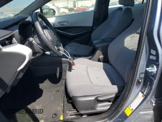 2023 Toyota Corolla Hybrid LE with VIN JTDBCMFE6P3015167, listed as a Copart auction lot 52114915 with 35,334 mi miles and Salvage Title. Bid and sale history available at carsss.com. Image 7.