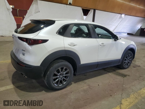 2022 Mazda CX-30 S with VIN 3MVDMBAL9NM410566, listed as a Copart auction lot 50513215 with 26,852 mi miles and Salvage Title. Bid and sale history available at DreamBid. Image 3.