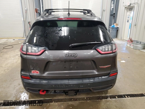 2019 Jeep Cherokee Trailhawk Elite с VIN 1C4PJMBN6KD162156, выставлен на аукционе Copart как лот 83041704 с пробегом 100 616 миль миль и Списание • Salvage title. История ставок и продаж доступна на DreamBid. Изображение 6.