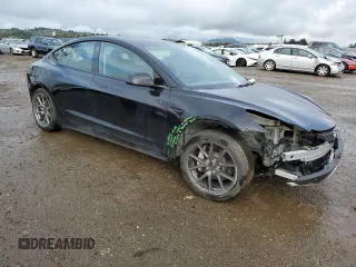 2022 Tesla Model 3 Long Range with VIN 5YJ3E1EB2NF313672, listed as a Copart auction lot 48896025 with 19,936 mi miles and Salvage Title. Bid and sale history available at DreamBid. Image 4.