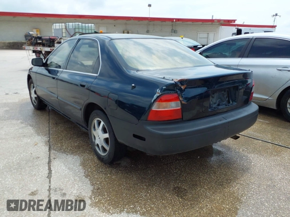 1994 Honda Accord EX with VIN 1HGCD5654RA042441, listed as a IAAI auction lot 42129570 with 121,220 mi miles and . Bid and sale history available at carsss.com. Image 3.
