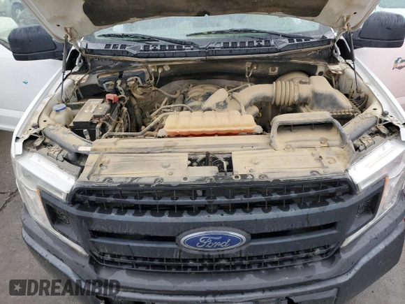 2018 Ford F-150 XL with VIN 1FTMF1C55JKD86563, listed as a Copart auction lot 81996294 with 148,399 mi miles and Clean title. Bid and sale history available at DreamBid. Image 11.