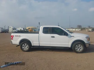 2020 Ford F-150 XL with VIN 1FTFX1E51LKF58027, listed as a IAAI auction lot 41207102 with 162,736 mi miles and . Bid and sale history available at DreamBid. Image 13.
