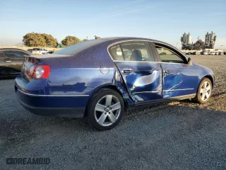 2009 Volkswagen Passat Sedan Turbo with VIN WVWJK73C89E027086, listed as a Copart auction lot 77447034 with 51,672 mi miles and Salvage Title. Bid and sale history available at carsss.com. Image 3.