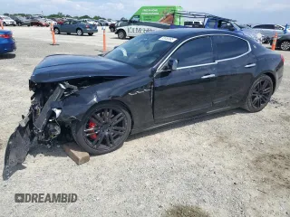 2015 Maserati Ghibli S Q4 with VIN ZAM57RTA6F1153409, listed as a Copart auction lot 53353985 with 32,103 mi miles and Salvage title. Bid and sale history available at DreamBid. Image 1.