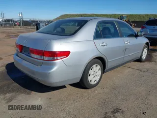 2003 Honda Accord LX with VIN JHMCM56303C043710, listed as a IAAI auction lot 41517509 with 283,083 mi miles and . Bid and sale history available at DreamBid. Image 4.