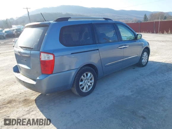 2010 Kia Sedona EX with VIN KNDMH4C32A6325352, listed as a IAAI auction lot 41863846 with 92,813 mi miles. Bid and sale history available at carsss.com. Image 4.