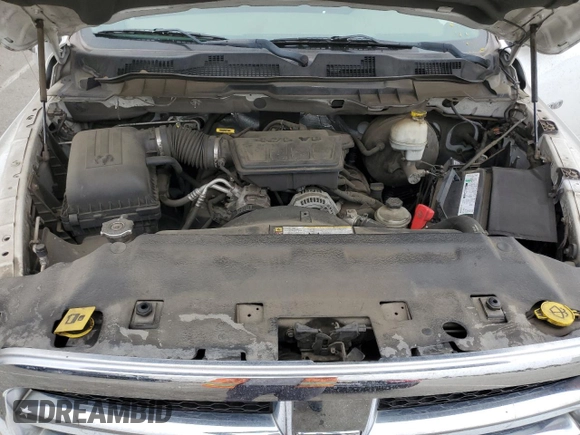 2011 Ram 1500 SLT with VIN 1D7RB1GP0BS672907, listed as a Copart auction lot 61641725 with 130,826 mi miles and Salvage title. Bid and sale history available at DreamBid. Image 11.