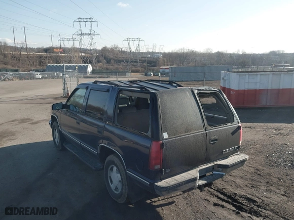 1998 Chevrolet Tahoe with VIN 1GNEK13R4WJ371916, listed as a IAAI auction lot 41689311 with 120,749 mi miles. Bid and sale history available at carsss.com. Image 12.