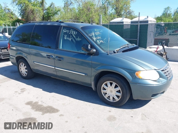 2007 Chrysler Town & Country LWB Touring with VIN 2A4GP54L47R167189, listed as a IAAI auction lot 42143590 with 165,547 mi miles. Bid and sale history available at carsss.com. Image 1.