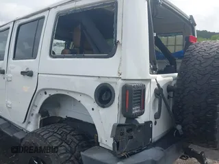 2016 Jeep Wrangler Unlimited Rubicon Hard Rock with VIN 1C4BJWFG3GL228449, listed as a IAAI auction lot 42158318 with Not provided miles and . Bid and sale history available at DreamBid. Image 16.