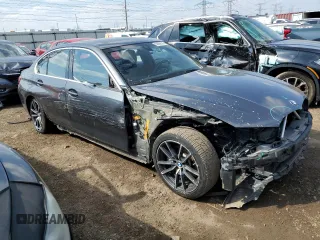 2019 BMW 3 Series 330i with VIN WBA5R1C55KAJ98853, listed as a Copart auction lot 50699315 with 101,110 mi miles and Salvage title. Bid and sale history available at DreamBid. Image 4.
