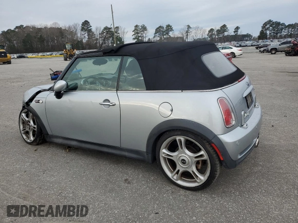 2005 MINI Convertible S with VIN WMWRH33575TK56034, listed as a Copart auction lot 88043565 with 33,410 mi miles and Salvage title. Bid and sale history available at DreamBid. Image 2.