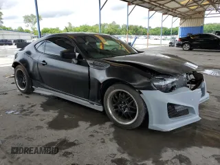 2014 Subaru BRZ Limited with VIN JF1ZCAC14E9601722, listed as a Copart auction lot 56002685 with 76,859 mi miles and Salvage title. Bid and sale history available at DreamBid. Image 4.