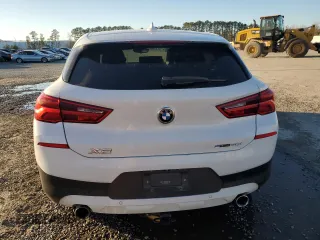 2018 BMW X2 sDrive28i with VIN WBXYJ3C3XJEJ81736, listed as a Copart auction lot 87390404 with 165,522 mi miles and Salvage Title. Bid and sale history available at carsss.com. Image 6.