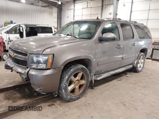 2013 Chevrolet Suburban LT with VIN 1GNSKJE76DR375916, listed as a IAAI auction lot 41588724 with 281,808 mi miles. Bid and sale history available at carsss.com. Image 2.