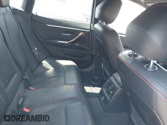 2015 BMW 4 Series 428i with VIN WBA4A5C56FG052023, listed as a IAAI auction lot 40085862 with 90,796 mi miles and . Bid and sale history available at carsss.com. Image 8.