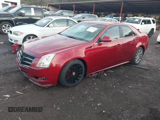 2010 Cadillac CTS Premium with VIN 1G6DS5EV7A0132321, listed as a IAAI auction lot 41290621 with 179,453 mi miles and . Bid and sale history available at DreamBid. Image 2.