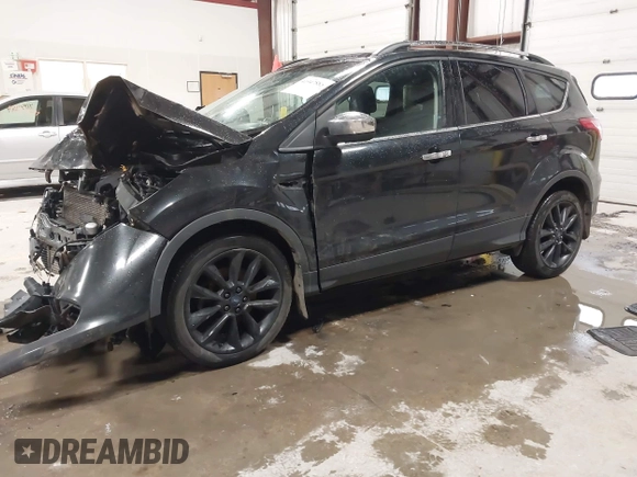 2015 Ford Escape SE with VIN 1FMCU9G91FUC49902, listed as a IAAI auction lot 41947883 with 140,670 mi miles. Bid and sale history available at carsss.com. Image 17.