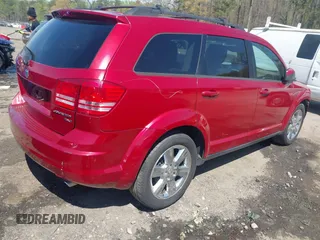 2009 Dodge Journey SXT with VIN 3D4GG57V39T522388, listed as a IAAI auction lot 41909709 with 208,738 mi miles. Bid and sale history available at carsss.com. Image 4.
