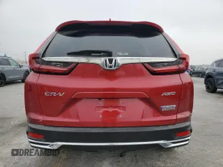 2021 Honda CR-V Touring z VIN 7FART6H96ME037070, wystawiony jako Copart lot #60664755 z przebiegiem 35 694 mil mil oraz Szkoda całkowita • Salvage title. Historia ofert i sprzedaży dostępna na DreamBid. Obrazek 6.