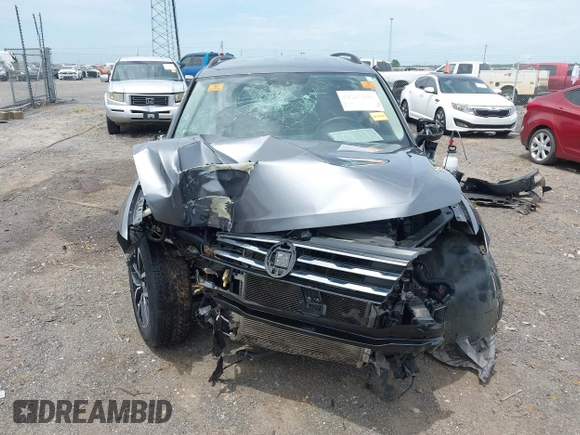 2021 Volkswagen Tiguan SE z VIN 3VV3B7AX8MM159316, wystawiony jako IAAI lot #42525546 z przebiegiem 70 141 mil mil oraz . Historia ofert i sprzedaży dostępna na DreamBid. Obrazek 12.