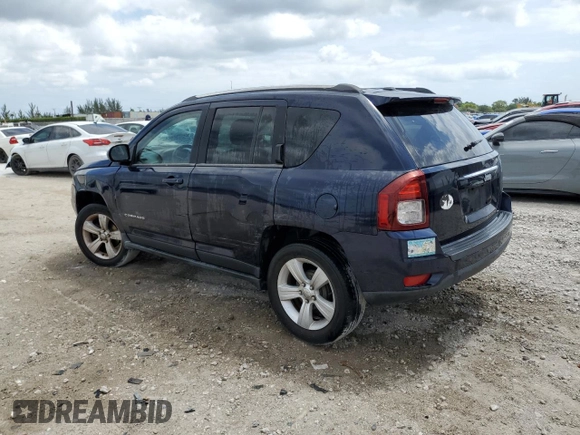 2014 Jeep Compass Latitude with VIN 1C4NJCEB5ED692156, listed as a Copart auction lot 53433385 with 124,348 mi miles and Salvage Title. Bid and sale history available at carsss.com. Image 2.