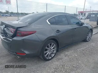 2021 Mazda 3 Select with VIN 3MZBPABL5MM252201, listed as a IAAI auction lot 42029577 with Not Provided miles and . Bid and sale history available at DreamBid. Image 4.
