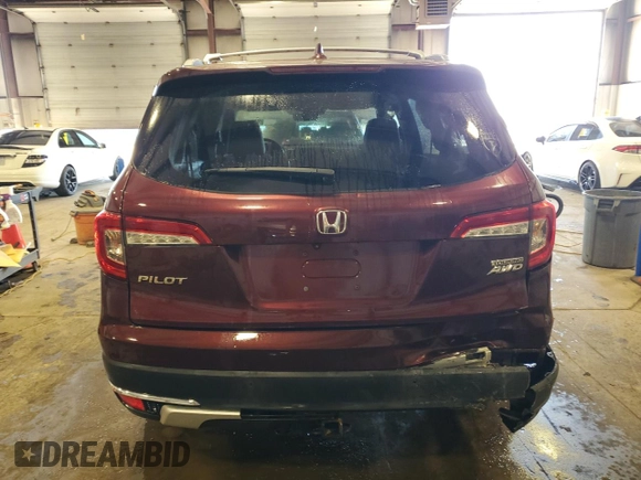 2019 Honda Pilot Touring 7-Passenger with VIN 5FNYF6H63KB012984, listed as a Copart auction lot 52826725 with 99,485 mi miles and Salvage Title. Bid and sale history available at carsss.com. Image 6.