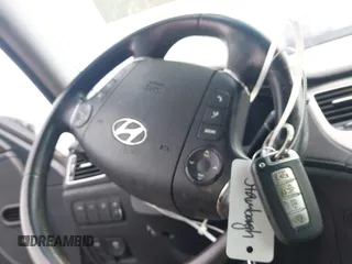 2013 Hyundai Genesis 3.8L z VIN KMHGC4DD9DU253791, wystawiony jako IAAI lot #42174577 z przebiegiem 162 259 mil mil oraz . Historia ofert i sprzedaży dostępna na DreamBid. Obrazek 11.