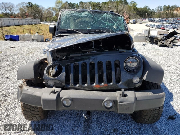 2014 Jeep Wrangler Unlimited Sport with VIN 1C4BJWDG7EL257811, listed as a Copart auction lot 50112335 with 218,530 mi miles and Salvage Title. Bid and sale history available at carsss.com. Image 5.