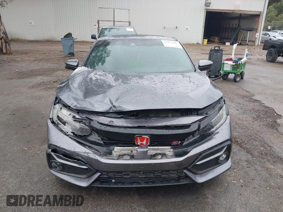 2020 Honda Civic Si with VIN 2HGFC3A57LH753345, listed as a IAAI auction lot 42074785 with 89,069 mi miles and . Bid and sale history available at DreamBid. Image 12.