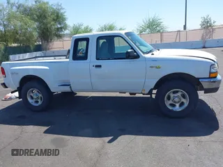 2000 Ford Ranger XL with VIN 1FTZR15V5YPB42970, listed as a IAAI auction lot 42366235 with 310,808 mi miles and . Bid and sale history available at DreamBid. Image 6.