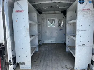 2021 Ford Transit Cargo with VIN 1FTYE1C87MKA94593, listed as a IAAI auction lot 42658954 with 99,425 mi miles and . Bid and sale history available at DreamBid. Image 3.