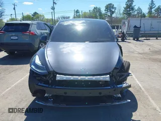 2024 Tesla Model Y Performance with VIN 7SAYGDEF1RA329825, listed as a IAAI auction lot 41762602 with 3,923 mi miles and . Bid and sale history available at DreamBid. Image 13.