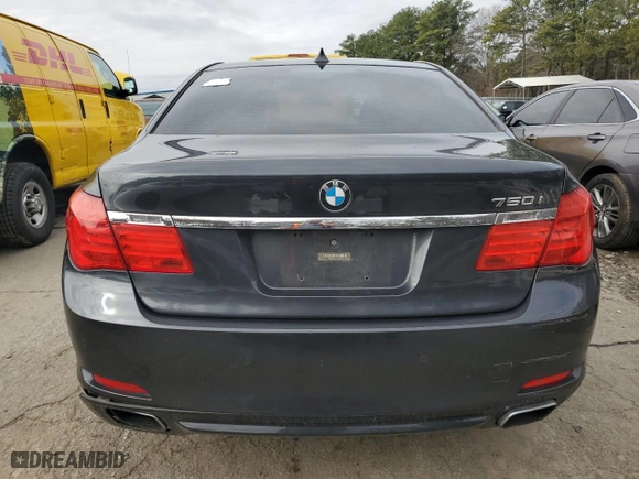 2012 BMW 7 Series 750i xDrive with VIN WBAKC6C52CC396443, listed as a Copart auction lot 44333945 with 134,075 mi miles and Salvage Title. Bid and sale history available at carsss.com. Image 6.