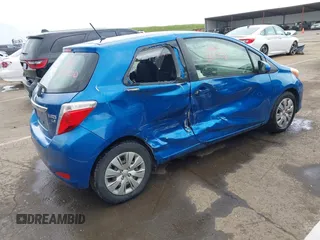 2013 Toyota Yaris L with VIN JTDJTUD3XDD572098, listed as a IAAI auction lot 41903113 with 106,900 mi miles. Bid and sale history available at carsss.com. Image 4.
