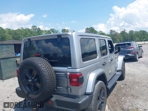 2021 Jeep Wrangler Unlimited Sahara with VIN 1C4HJXEN3MW628845, listed as a IAAI auction lot 42438049 with 49,970 mi miles and . Bid and sale history available at DreamBid. Image 4.