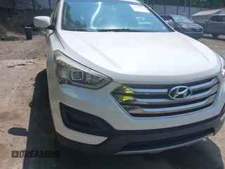 2015 Hyundai Santa Fe z VIN 5XYZTDLB3FG298677, wystawiony jako IAAI lot #42436155 z przebiegiem 118 181 mil mil oraz . Historia ofert i sprzedaży dostępna na DreamBid. Obrazek 18.