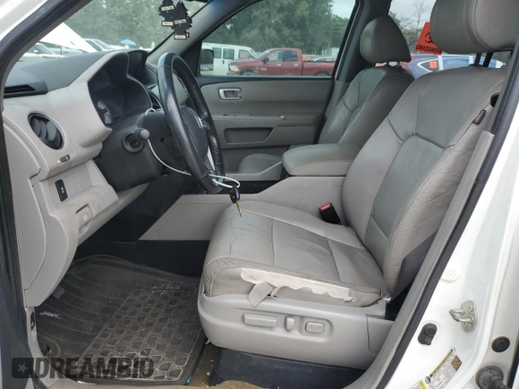 2015 Honda Pilot EX-L z VIN 5FNYF3H77FB007042, wystawiony jako Copart lot #60122705 z przebiegiem 183 727 mil mil oraz Szkoda całkowita • Salvage title. Historia ofert i sprzedaży dostępna na DreamBid. Obrazek 7.