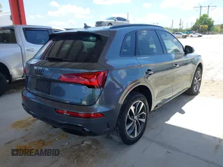2024 Audi Q5 S line Premium z VIN WA1GAAFY5R2109175, wystawiony jako IAAI lot #41938991 z przebiegiem 7133 mil mil oraz . Historia ofert i sprzedaży dostępna na DreamBid. Obrazek 4.