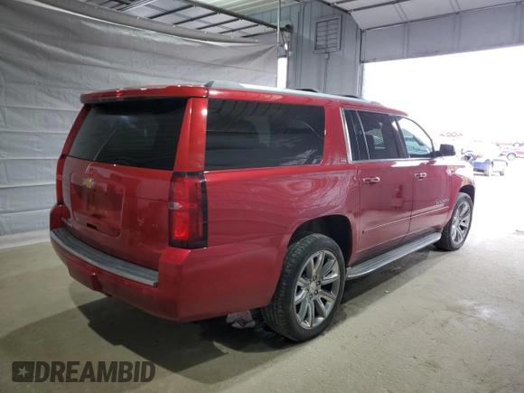 2015 Chevrolet Suburban LTZ with VIN 1GNSKKKC7FR299567, listed as a Copart auction lot 52944035 with 147,964 mi miles and Salvage Title. Bid and sale history available at DreamBid. Image 3.