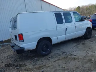 2003 Ford Econoline Cargo with VIN 1FTRE14263HA39384, listed as a IAAI auction lot 41267380 with 317,767 mi miles and . Bid and sale history available at DreamBid. Image 4.