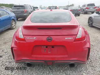 2016 Nissan 370Z Sport z VIN JN1AZ4EH7GM931035, wystawiony jako IAAI lot #42311165 z przebiegiem 83 947 mil mil oraz . Historia ofert i sprzedaży dostępna na DreamBid. Obrazek 16.
