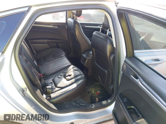 2013 Ford Fusion Titanium with VIN 3FA6P0K92DR200035, listed as a IAAI auction lot 42798129 with 242,831 mi miles and . Bid and sale history available at DreamBid. Image 8.