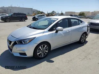 2021 Nissan Versa SV with VIN 3N1CN8EV9ML831445, listed as a Copart auction lot 59532985 with 76,536 mi miles and Salvage title. Bid and sale history available at DreamBid. Image 1.