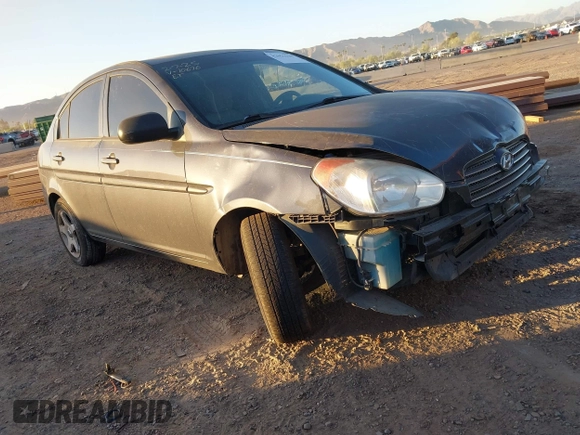 2011 Hyundai Accent GLS with VIN KMHCN4AC7BU610676, listed as a IAAI auction lot 42051520 with 165,902 mi miles. Bid and sale history available at carsss.com. Image 1.