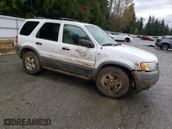 2001 Ford Escape XLT with VIN 1FMYU04181KC55393, listed as a Copart auction lot 76321074 with 223,327 mi miles and Salvage Title. Bid and sale history available at carsss.com. Image 4.