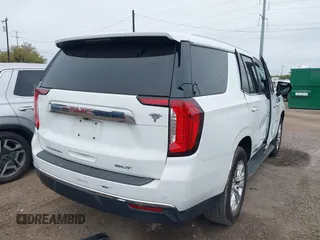 2022 GMC Yukon SLT with VIN 1GKS1BKD9NR314142, listed as a IAAI auction lot 41117401 with 53,111 mi miles. Bid and sale history available at carsss.com. Image 4.
